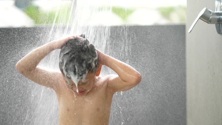 A Boys Taking a Shower